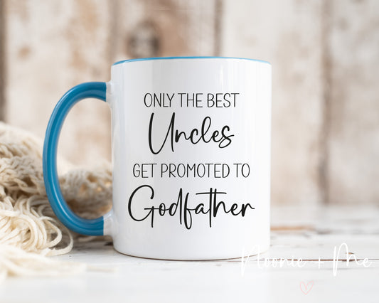 Mug with text 'Only the best Uncles get promoted to Godfather' on a blurred background